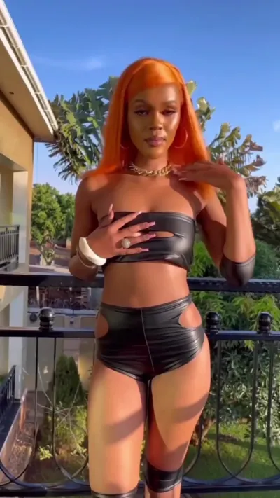 Kin Bella flaunts Butt Cheeks, Sexy Body in Tiny Latex Bikini Outfit