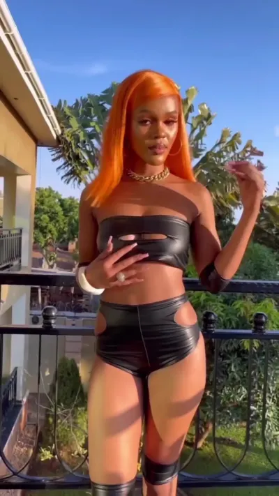 Kin Bella flaunts Butt Cheeks, Sexy Body in Tiny Latex Bikini Outfit